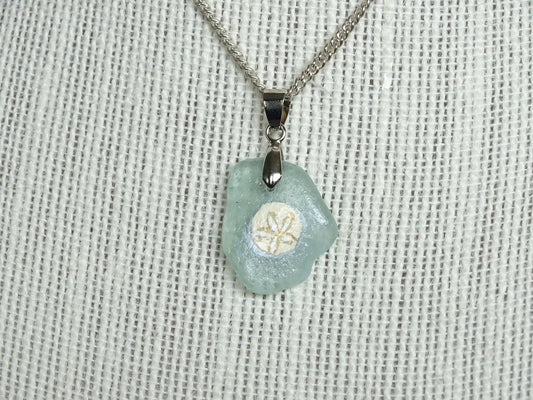 Sand dollar painted on green sea glass pendant