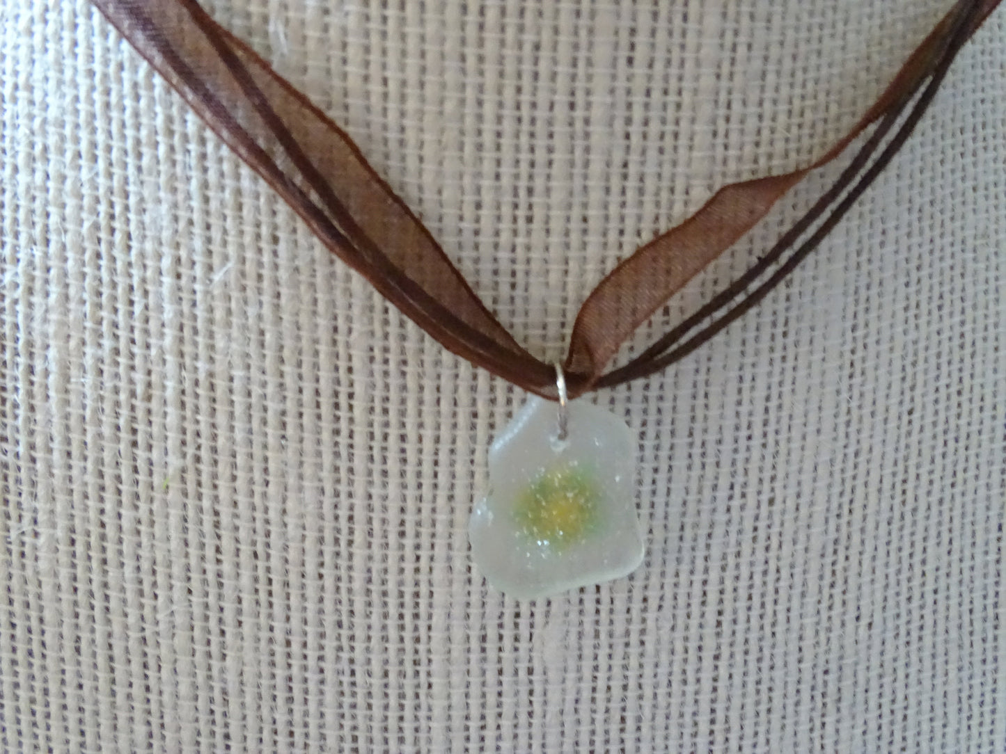 Sunflower painted on sea glass pendant