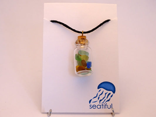 Sea glass bottle pendant with black cord
